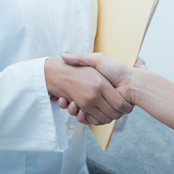 Two people shaking hands