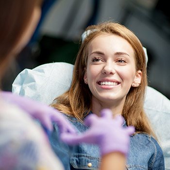 Smiling woman in dental chair