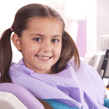 happy girl at dentist