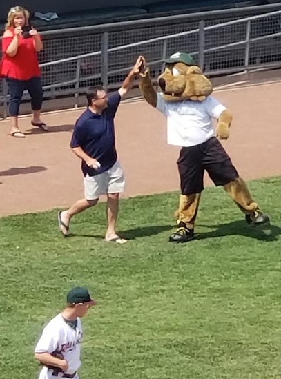 dr highfiving the mascot