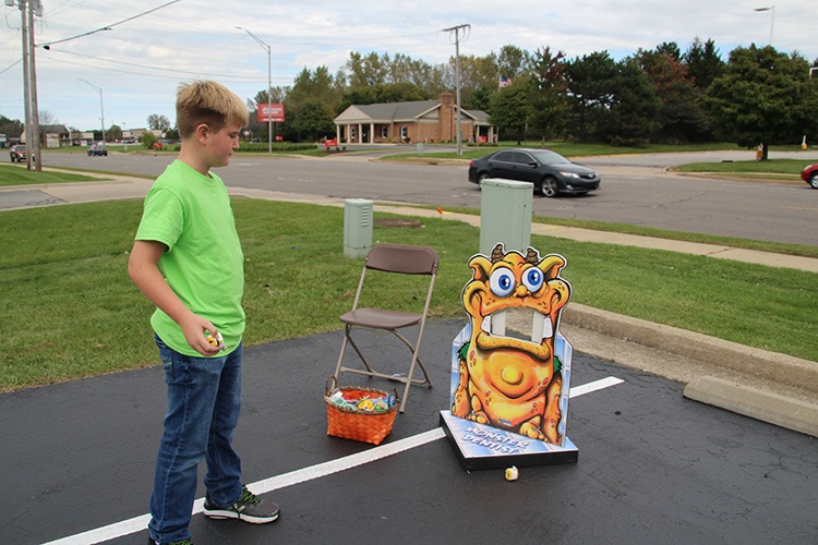 boy playing monster dentist