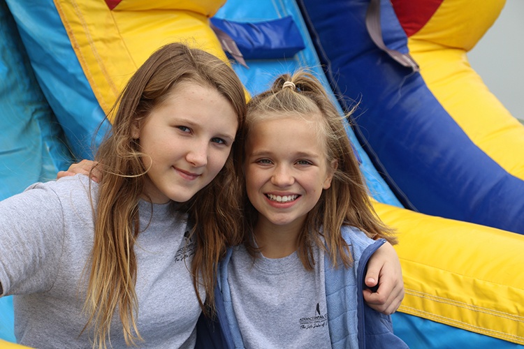 sisters smiling