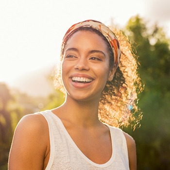 A young woman smiling