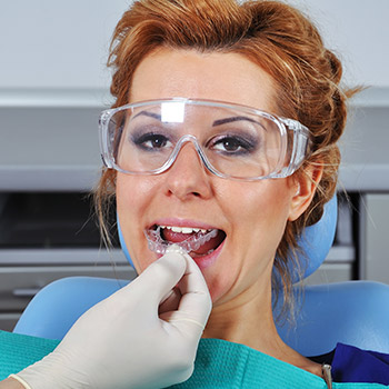 Woman being fitted for occlusal splint